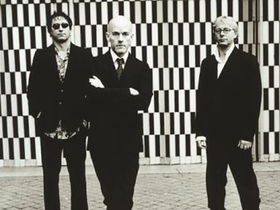 R.E.M. joined onstage by first producers